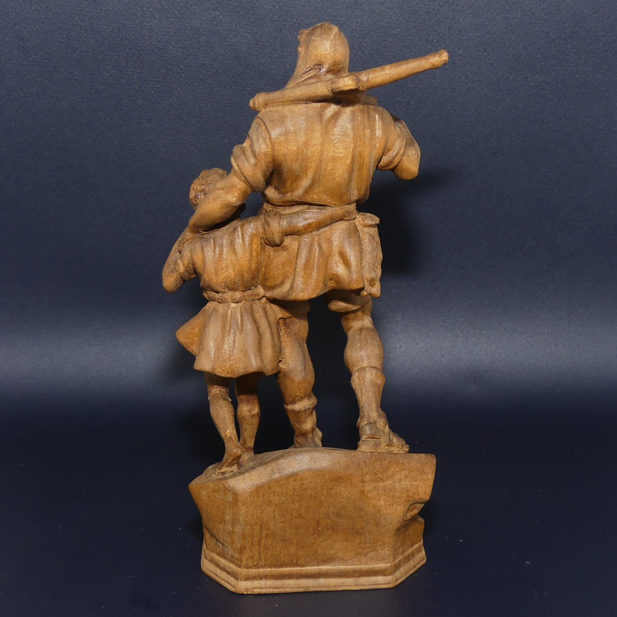 Wooden finely carved figure of Hunter and Son | Swiss | perhaps by Walter Stahli