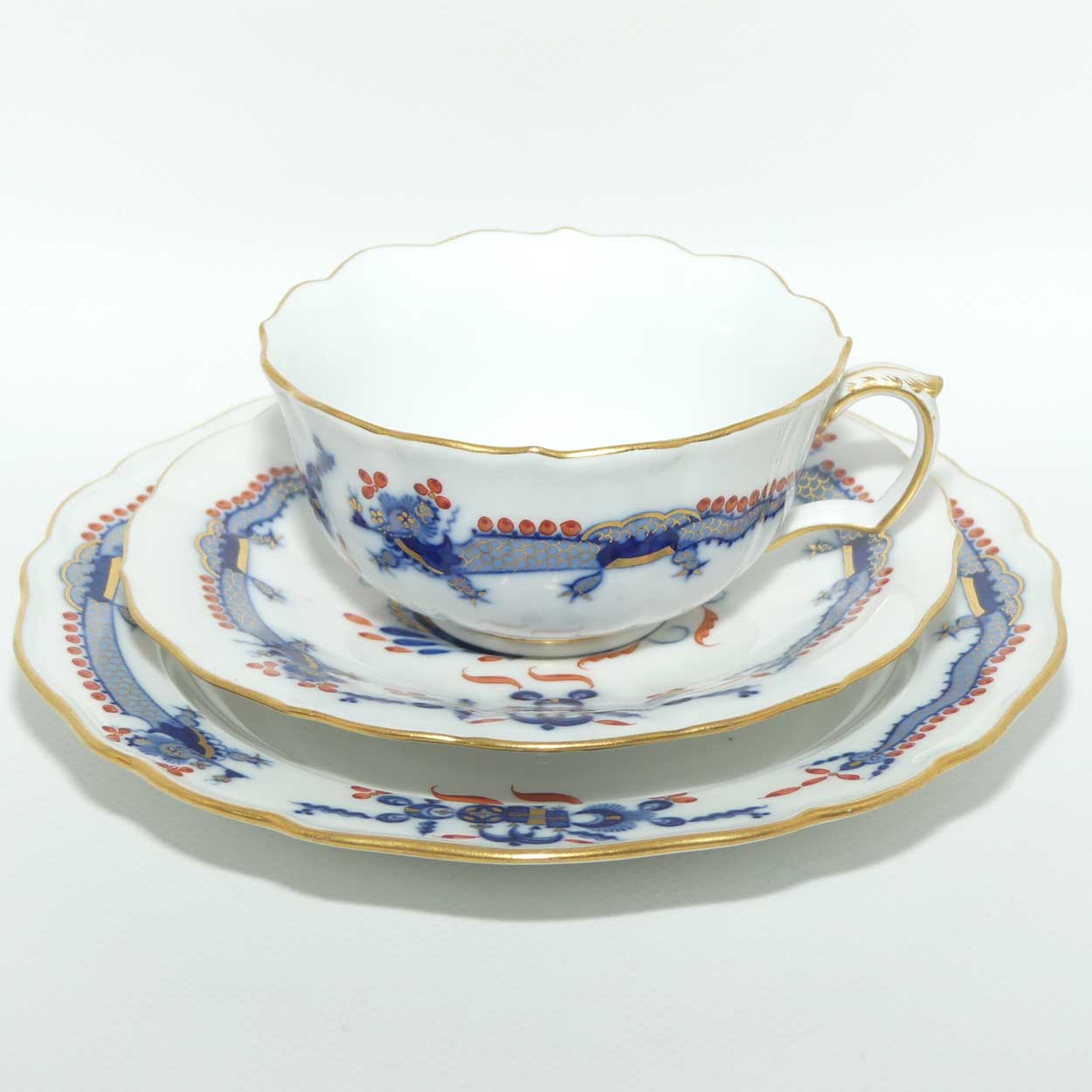 Meissen Blue Dragon with Red Highlights tea trio trimmed with gilt