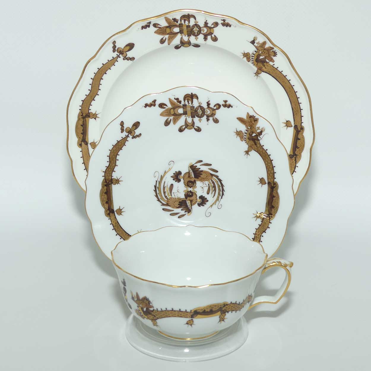 Meissen Brown Dragon tea trio trimmed with gilt