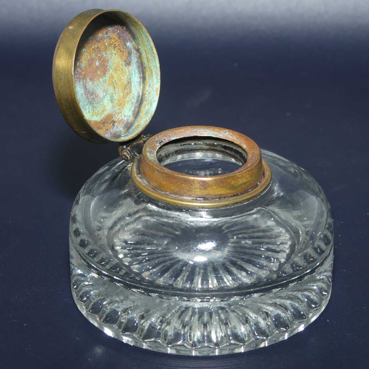 Edwardian era hinged Brass Lid and Glass base Inkwell