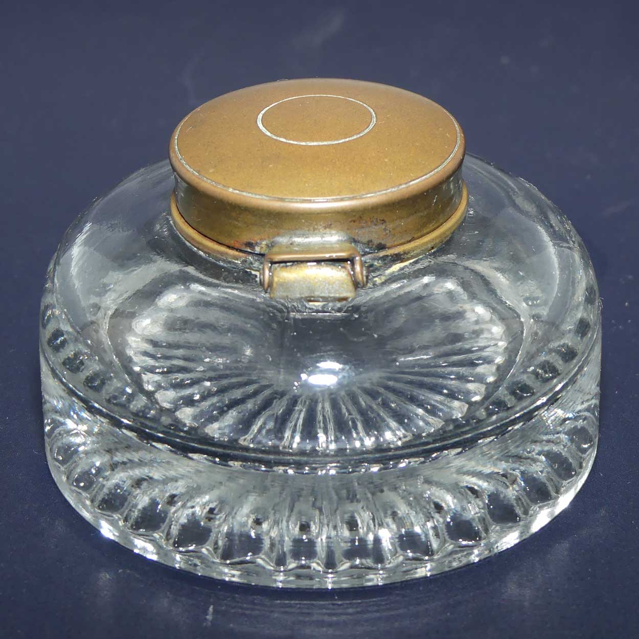 Edwardian era hinged Brass Lid and Glass base Inkwell