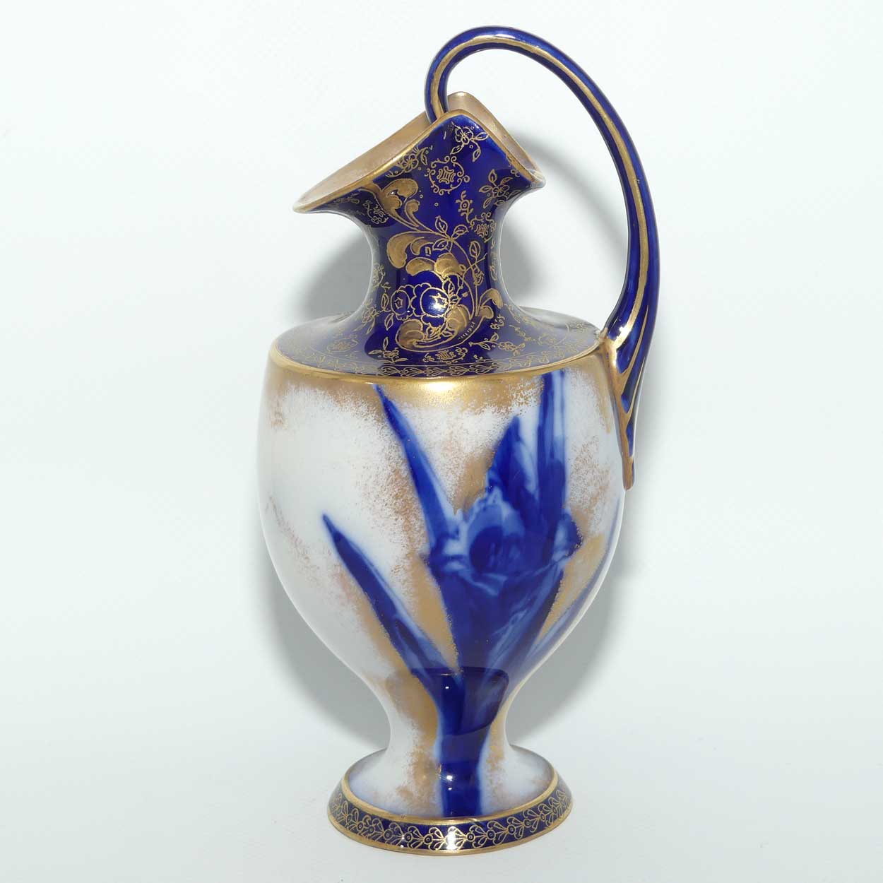 Doulton Burslem Blue Iris and Daffodil loop handle jug with gilt highlights