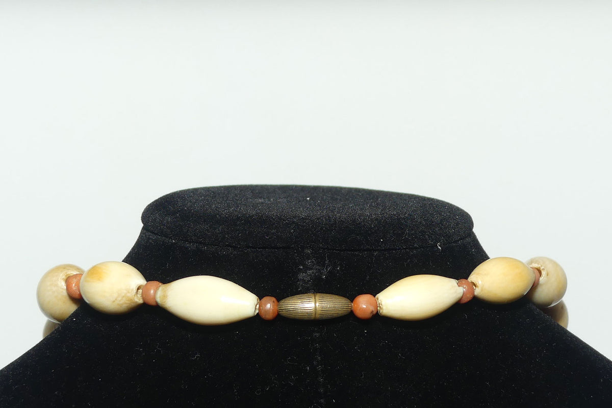 Very Heavy Antique set of Graduated Elongated Ivory Beads with feature Coral beads