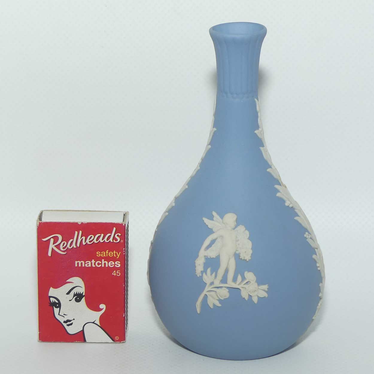 Wedgwood Jasper | White on Pale Blue | Narrow neck bud vase | Cupid design | #1