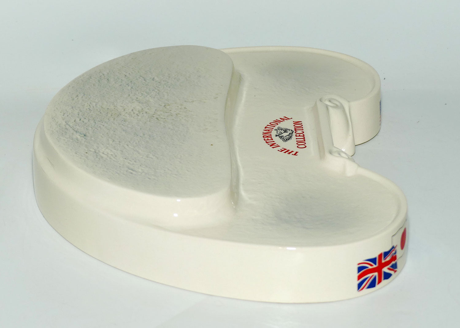D- Royal Doulton small character jug The International Collection jug or liquor container stand