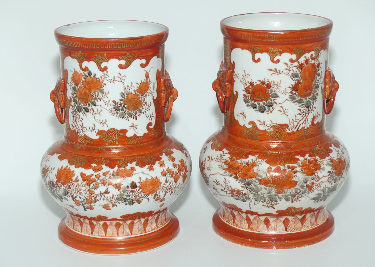 Pair of Japanese Kutani vases | Floral Decoration with figural handles | signed to base