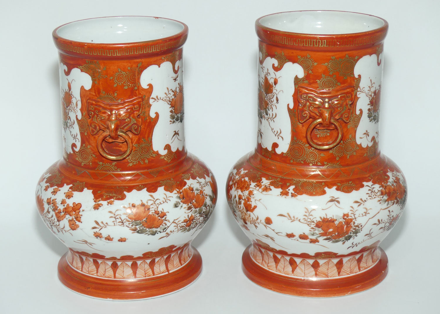 Pair of Japanese Kutani vases | Floral Decoration with figural handles | signed to base