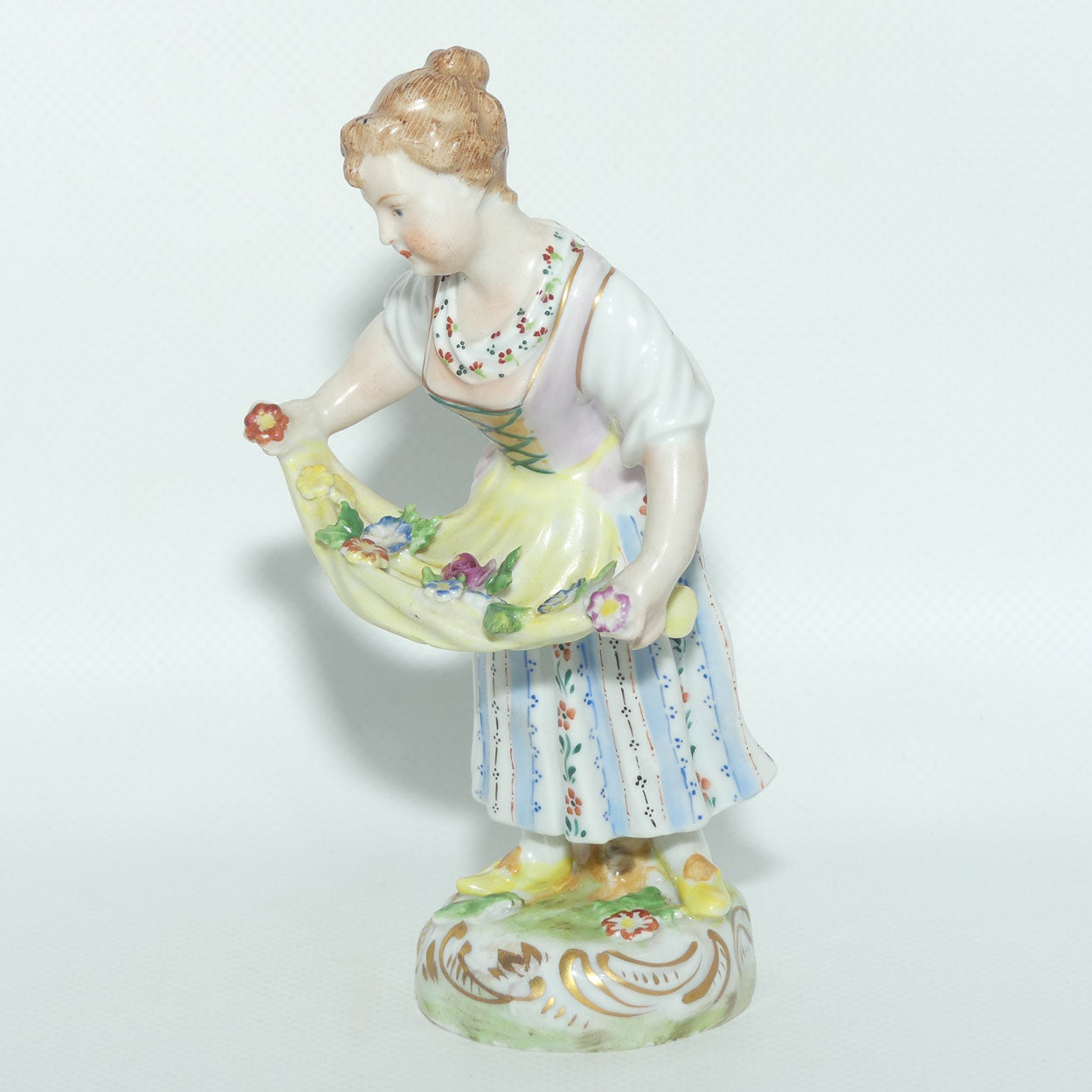 Dresden figure | 18th Century Girl Gathering Flowers