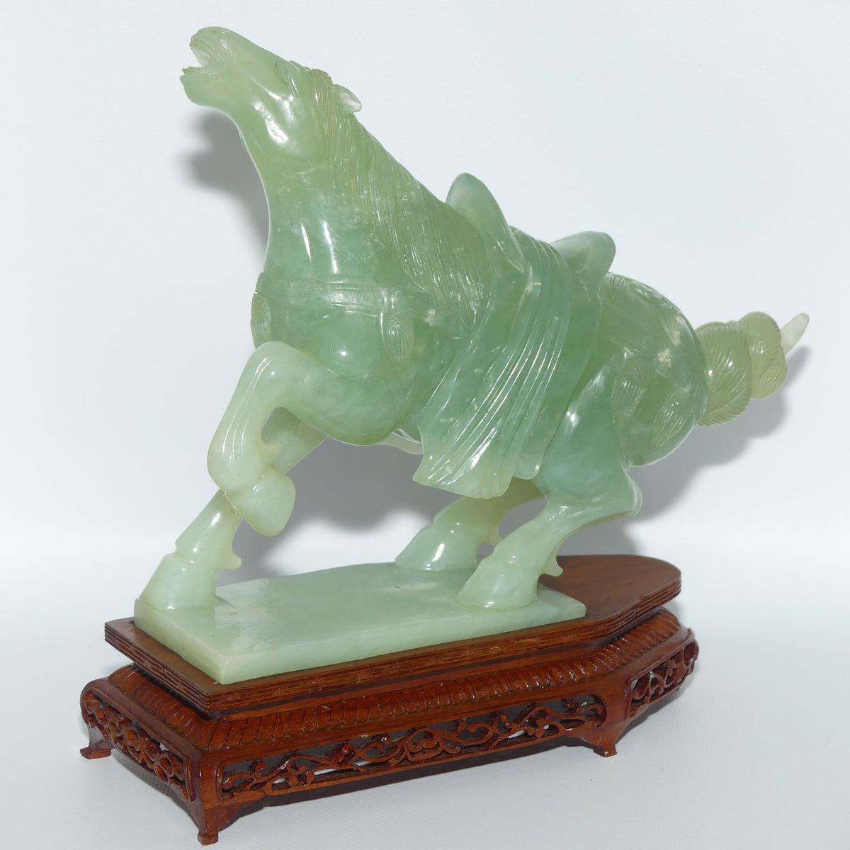 Early to Mid 20th Century Chinese Green Jade Warrior Horse on Wooden base