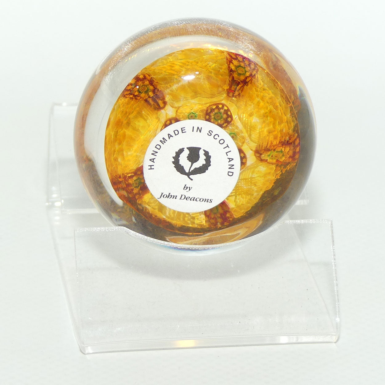 John Deacons Scotland Complex Latticino Garland miniature paperweight | Amber