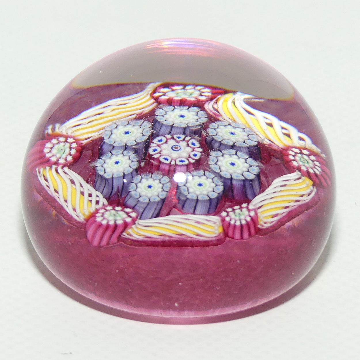 John Deacons Scotland Complex Latticino Garland miniature paperweight | Cranberry