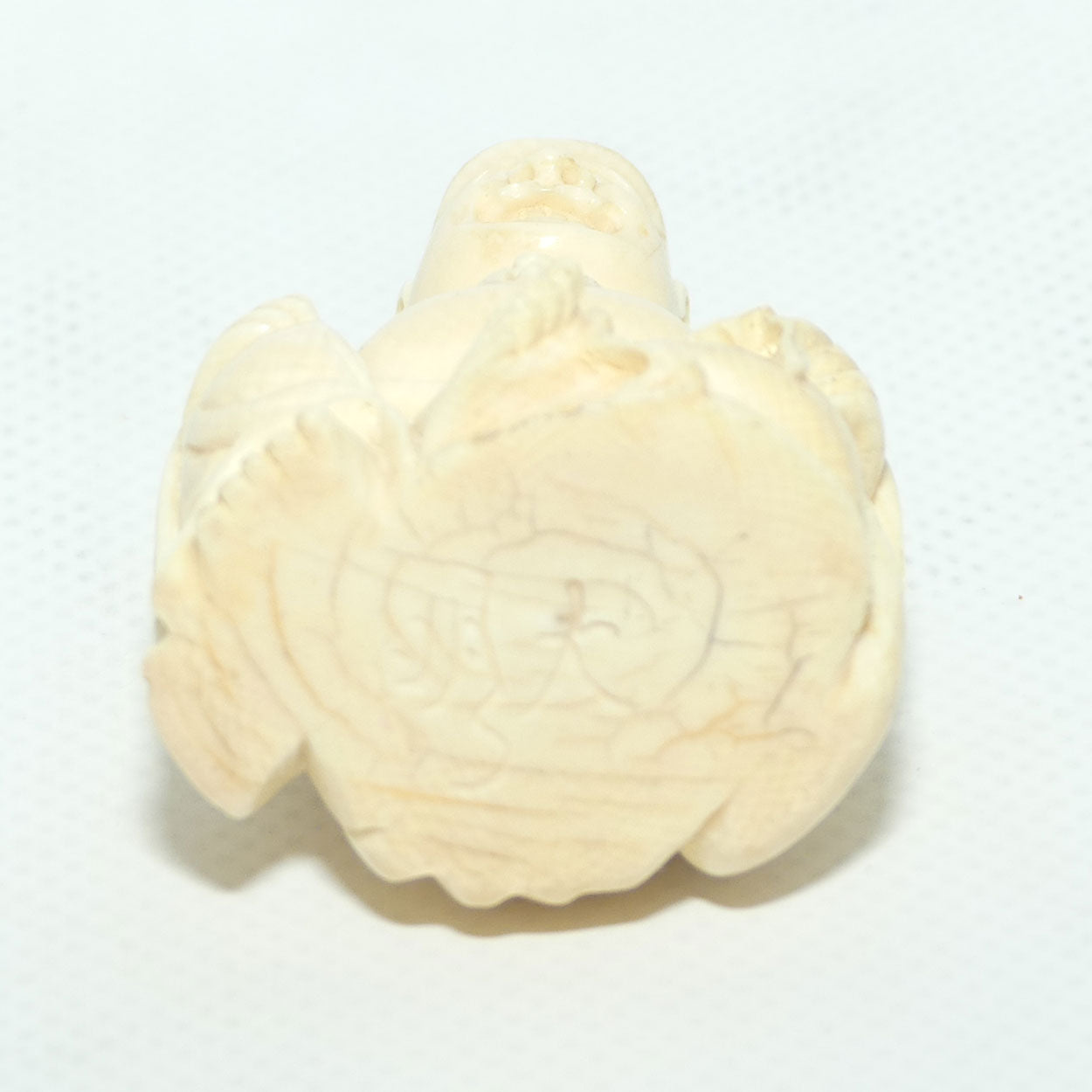 Beautifully carved Ivory Laughing Buddha Seated on Wooden Stand | signed | 7.5cm tall