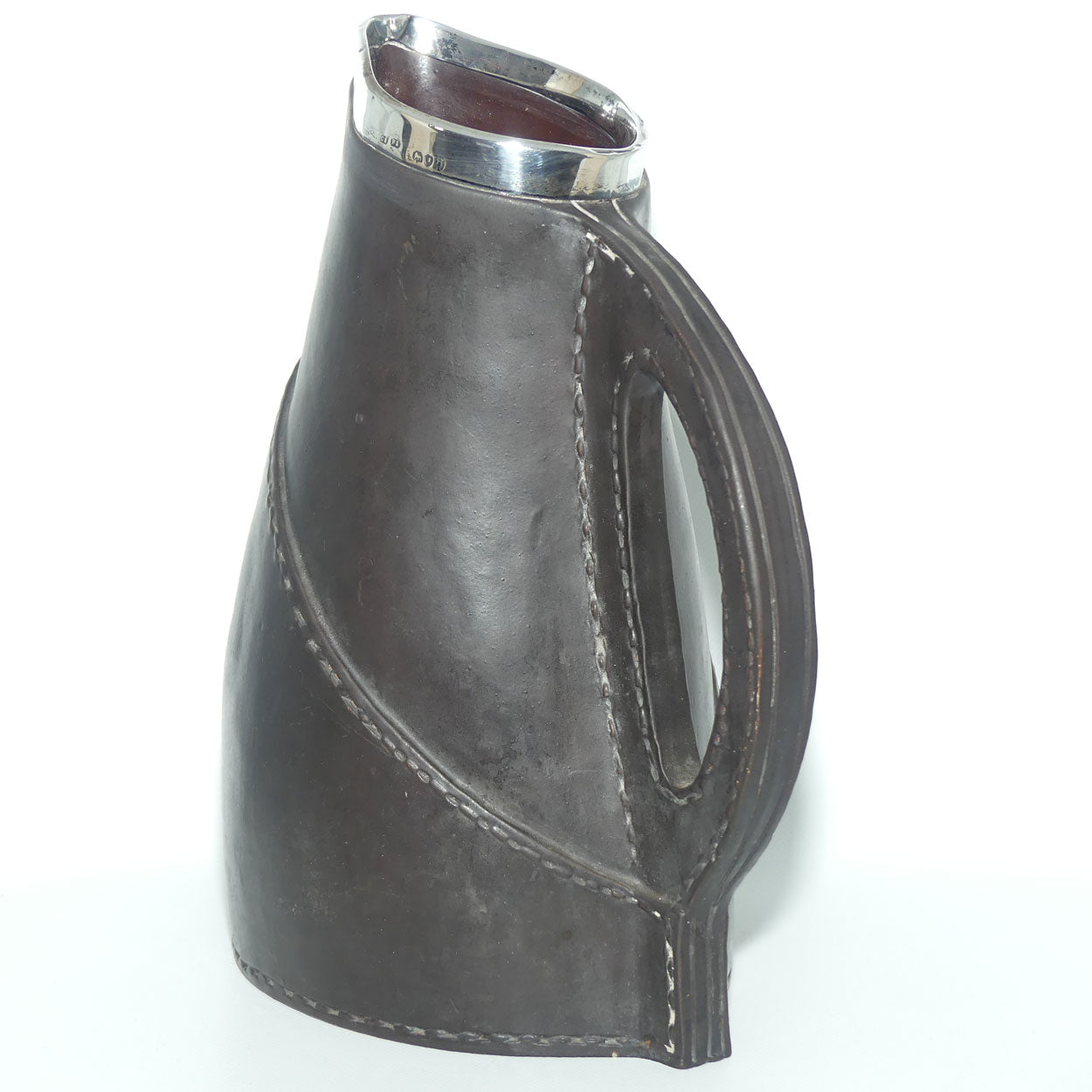 Doulton Lambeth England Leatherware jug with Sterling Silver rim