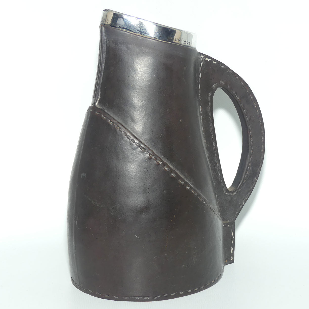 Doulton Lambeth England Leatherware jug with Sterling Silver rim