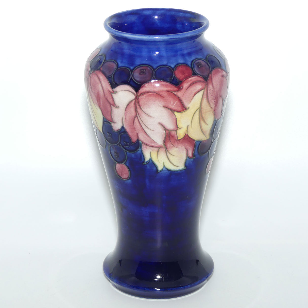 William Moorcroft Leaves and Fruit conical vase