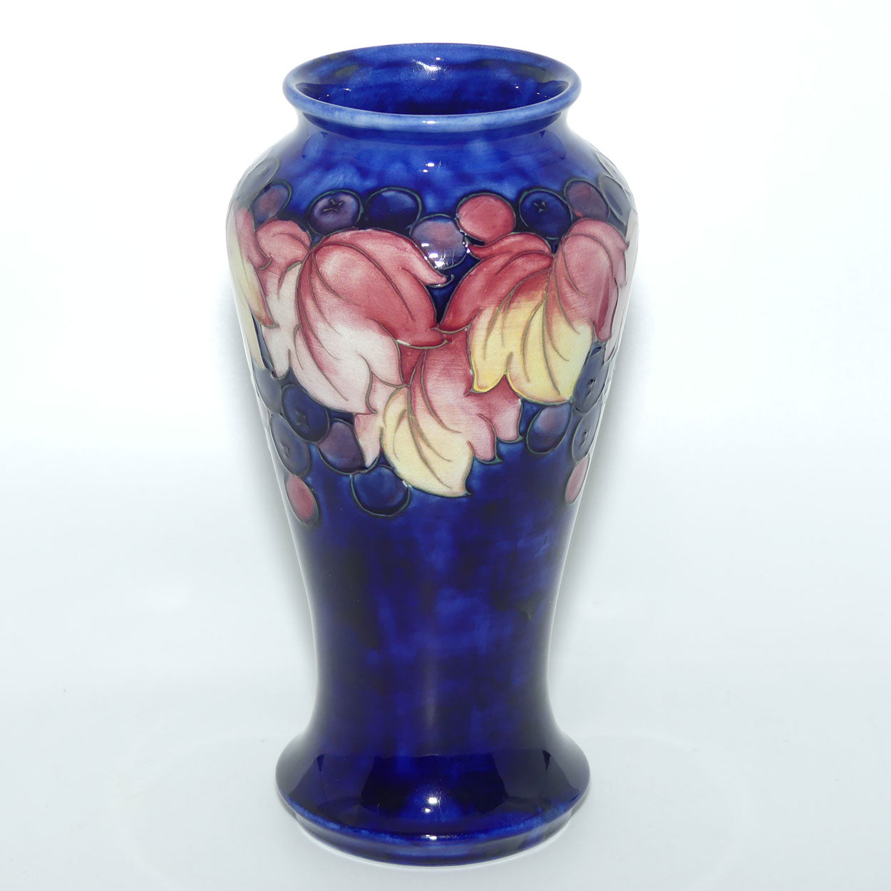William Moorcroft Leaves and Fruit conical vase