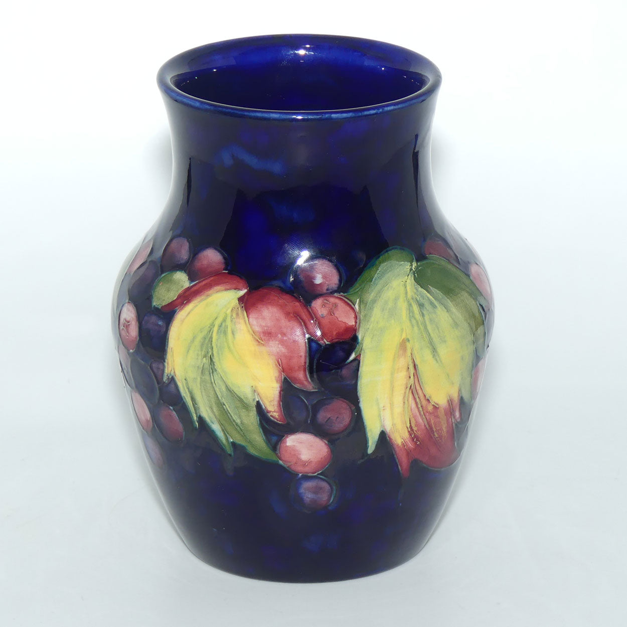 William Moorcroft Leaves and Fruit (Blue) waisted vase