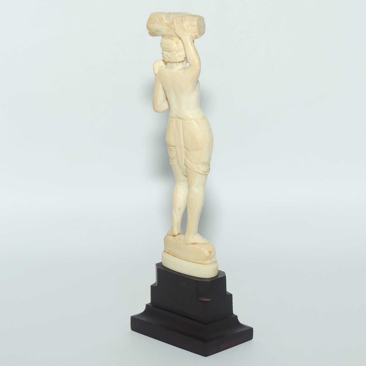 Carved Ivory Figure on Rosewood base | Man with Axe Carrying Log on Head | 17cm