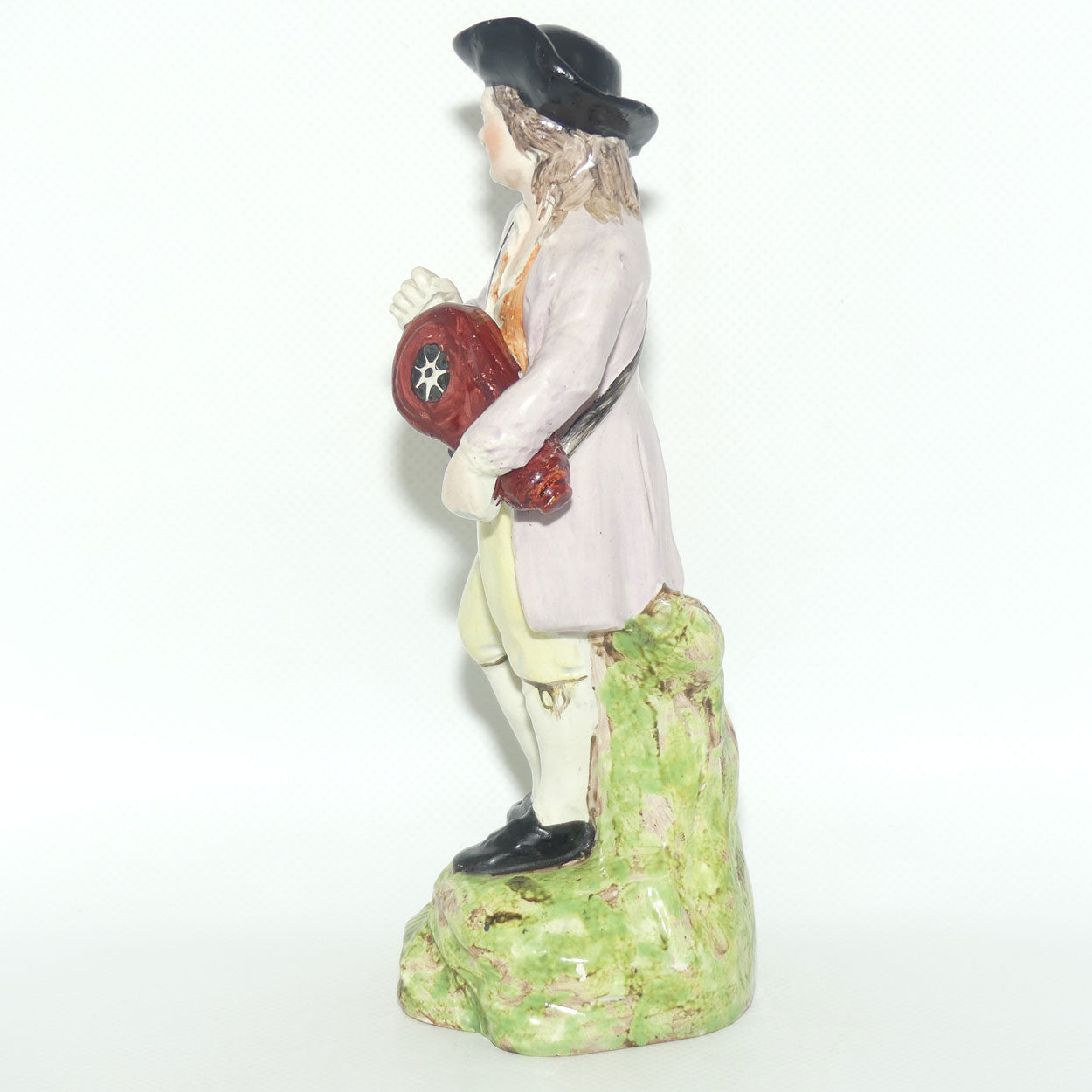 19th Cent English Pottery Man in Hat Carrying Instrument