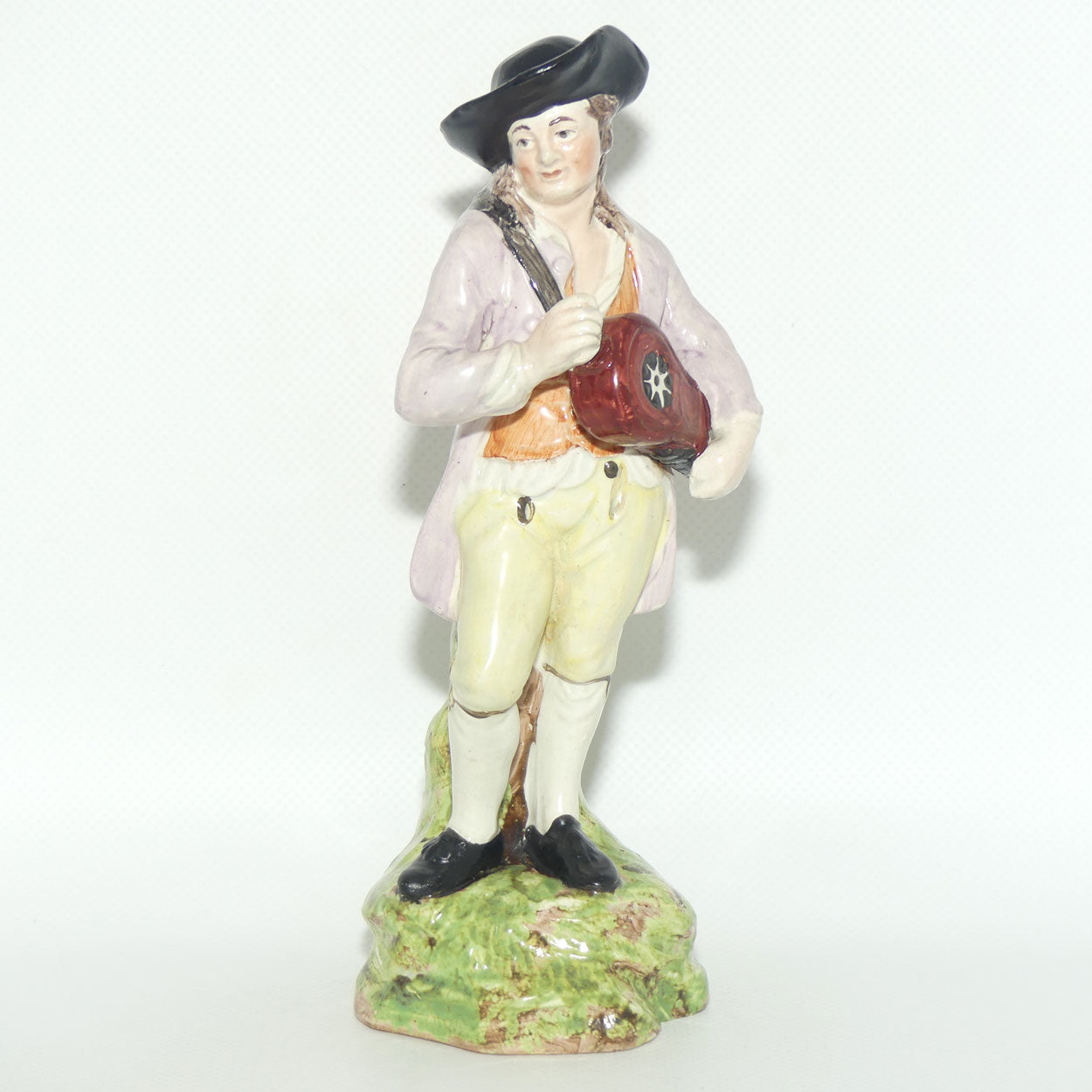19th Cent English Pottery Man in Hat Carrying Instrument