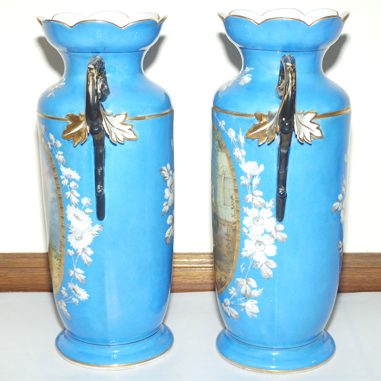 Pair of Continental European mantle vases with courting couple scenes c.1890
