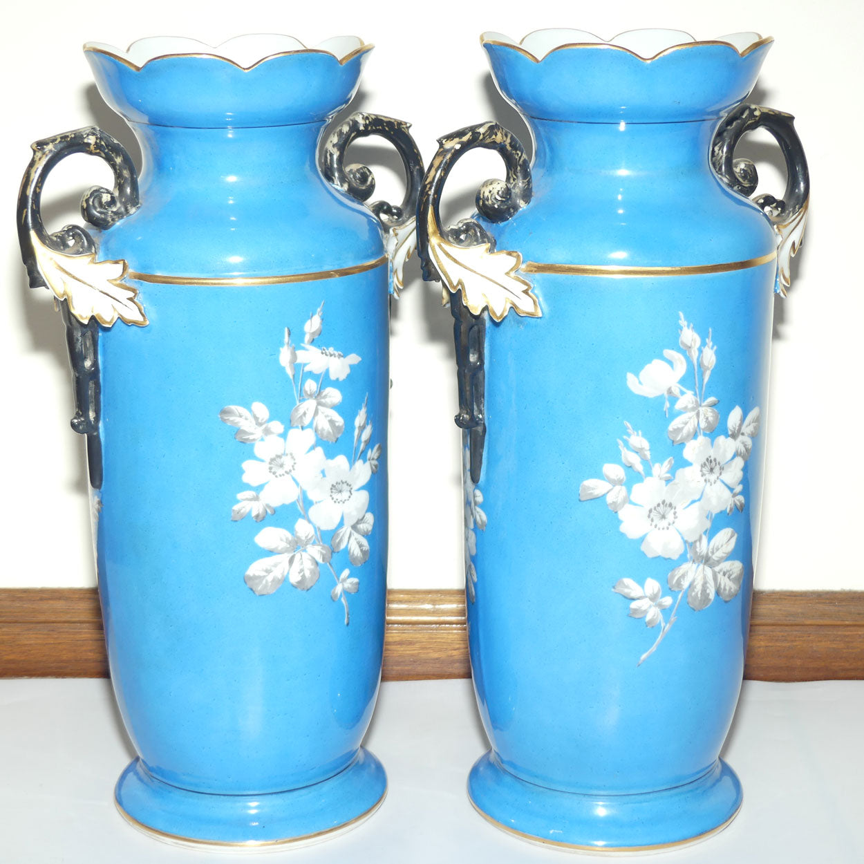 Pair of Continental European mantle vases with courting couple scenes c.1890