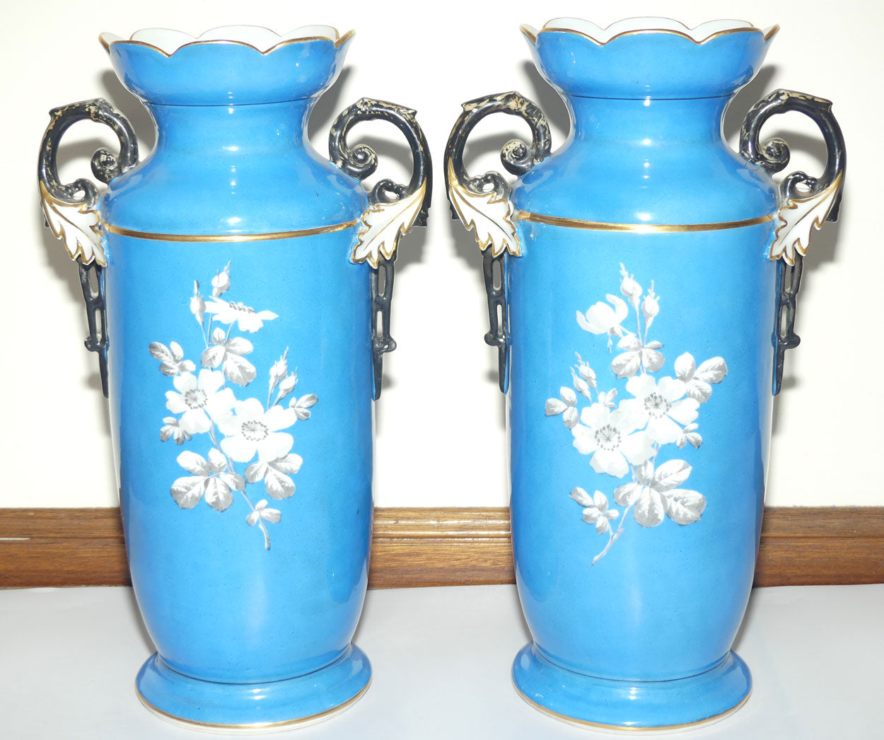 Pair of Continental European mantle vases with courting couple scenes c.1890