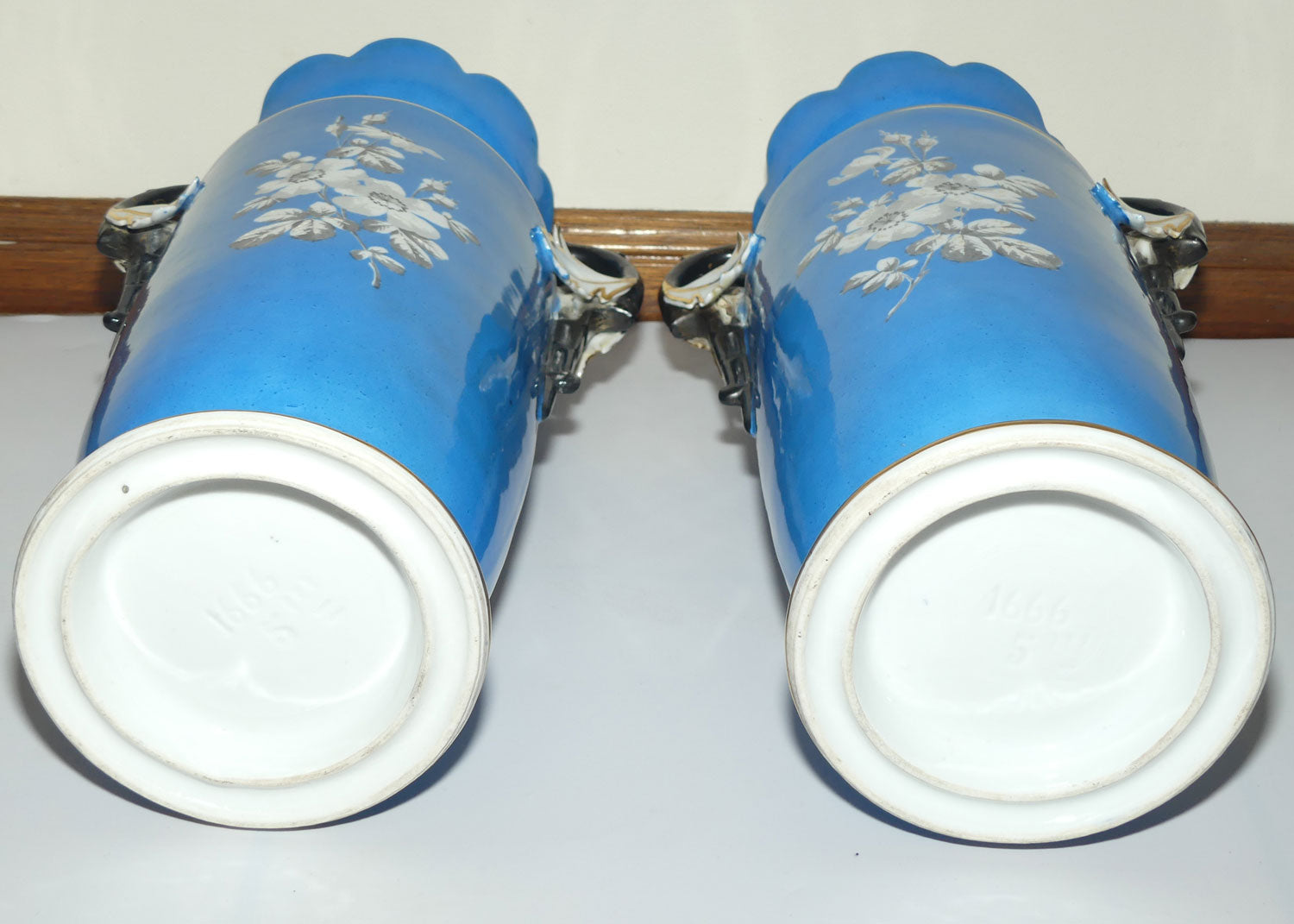 Pair of Continental European mantle vases with courting couple scenes c.1890