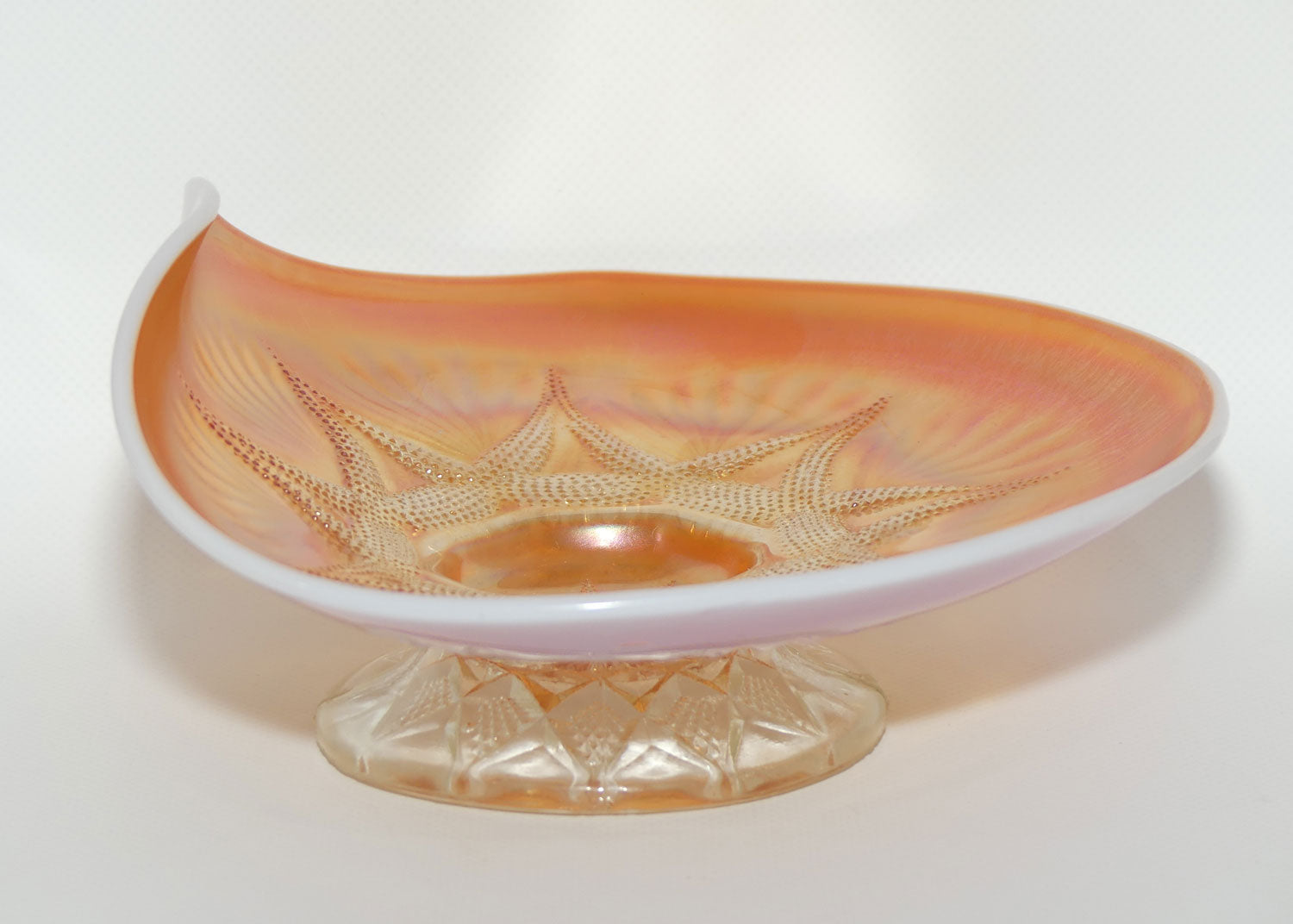 Dugan Carnival Glass | Ski Star pattern | Peach Opalescent colour
