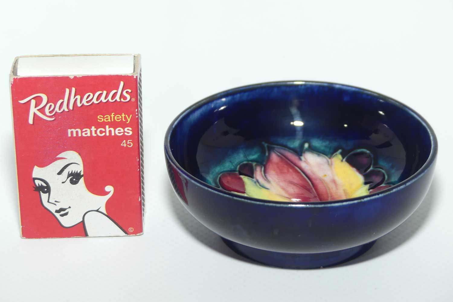 Walter Moorcroft Leaf and Fruit with Blue ground miniature footed bowl | 7.9cm diam