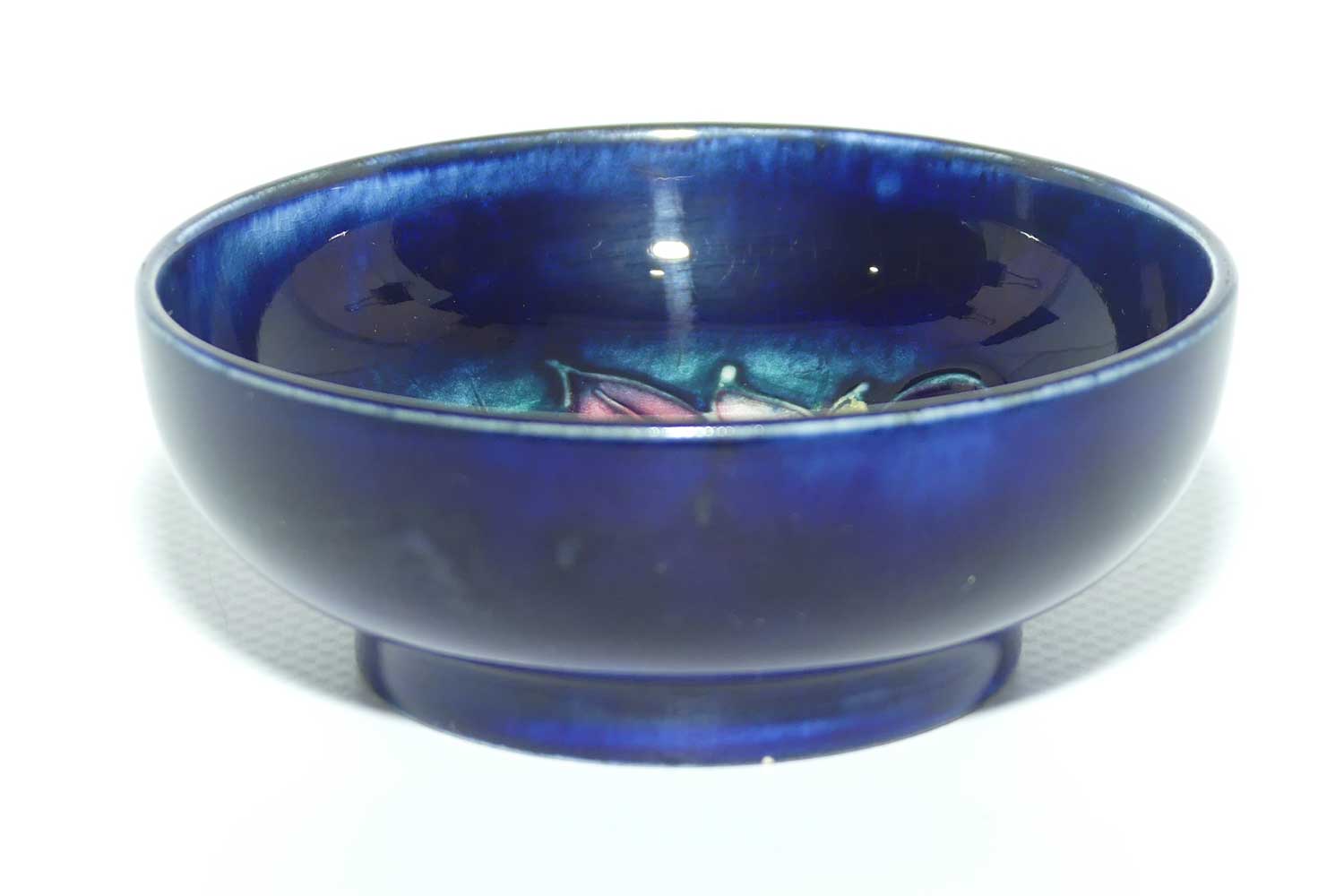 Walter Moorcroft Leaf and Fruit with Blue ground miniature footed bowl | 7.9cm diam
