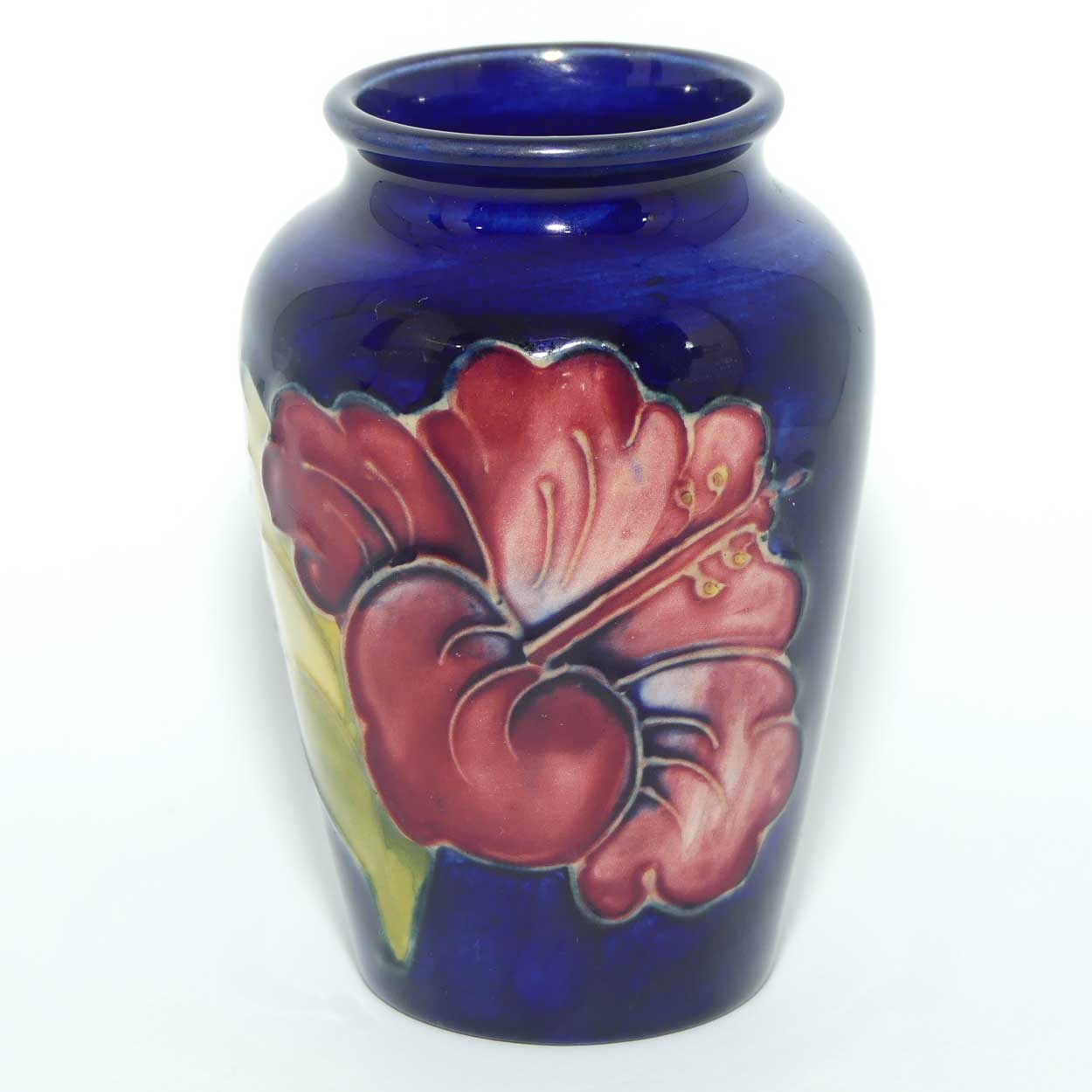 Walter Moorcroft Hibiscus on Blue ground small vase | Original Paper Label to base