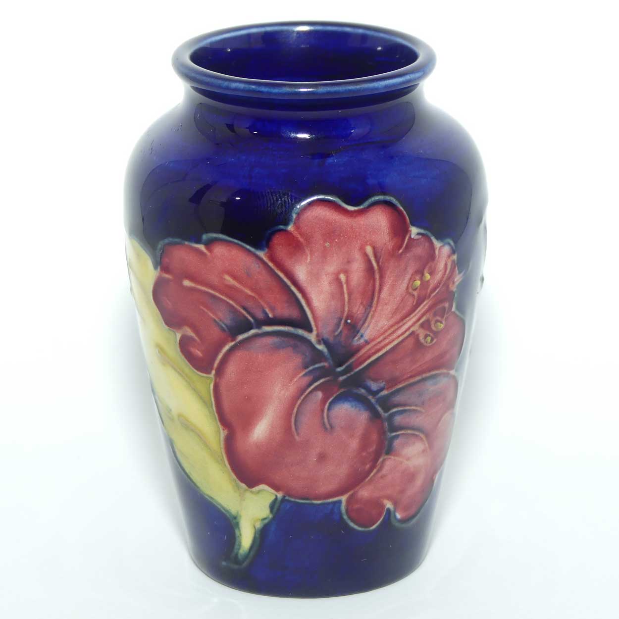 Walter Moorcroft Hibiscus on Blue ground small vase | Original Paper Label to base