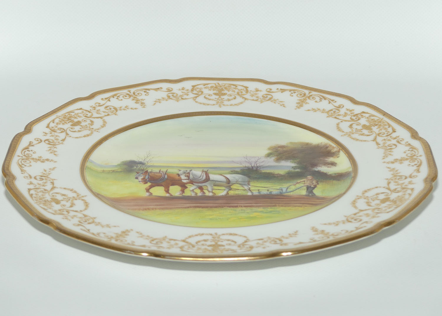 Royal Doulton hand painted and gilt Ploughing plate (Morrey)
