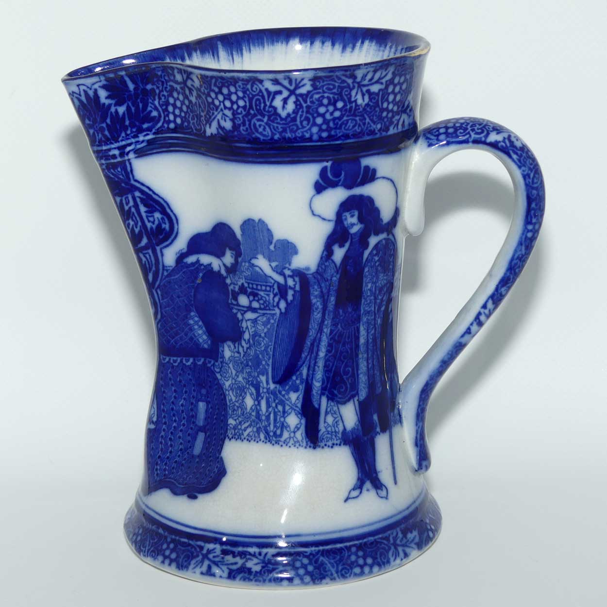Royal Doulton Morrisian Flow Blue WH Bradley Eastern Figures Tudor shape jug