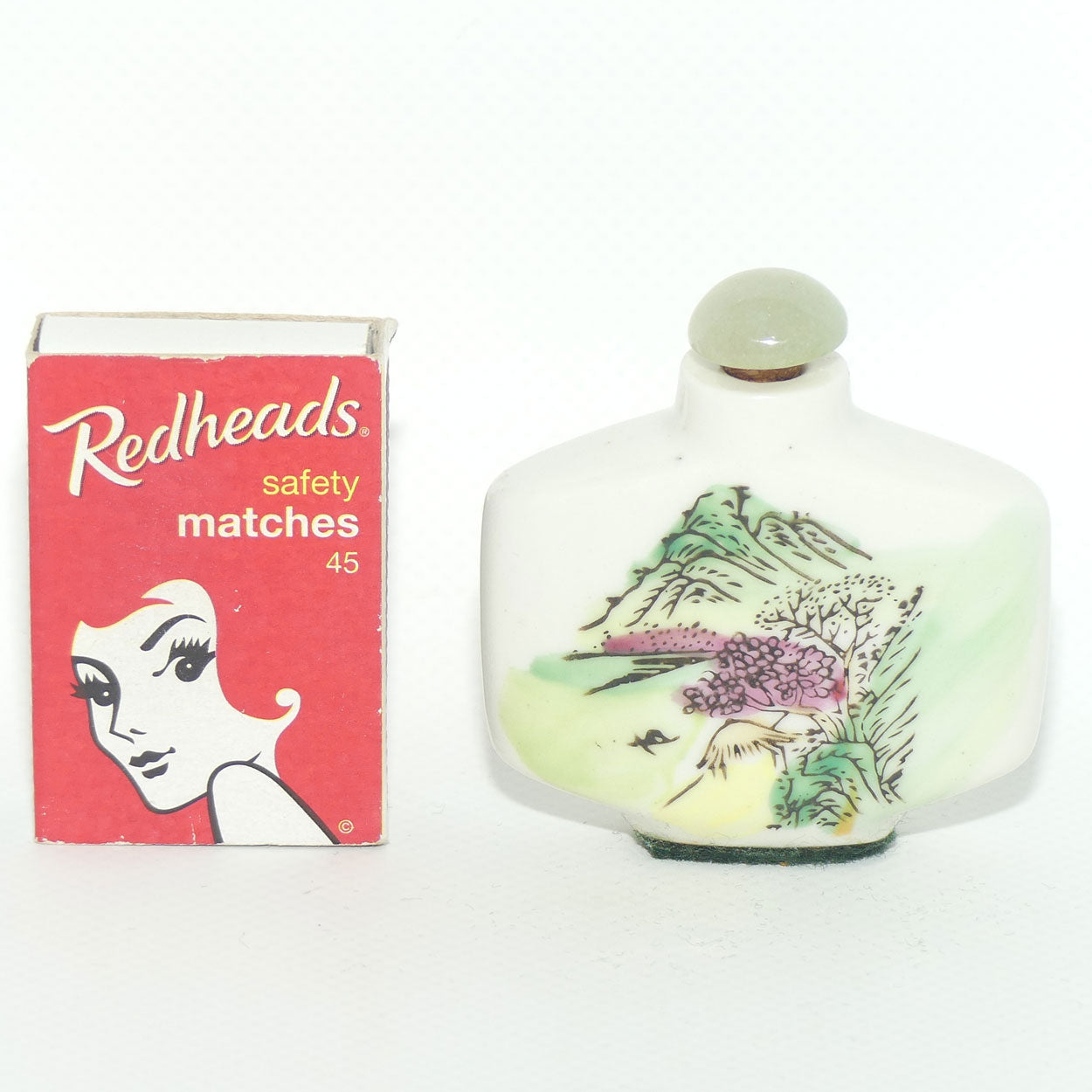 Chinese snuff bottle with greenstone stopper | Mountain scene