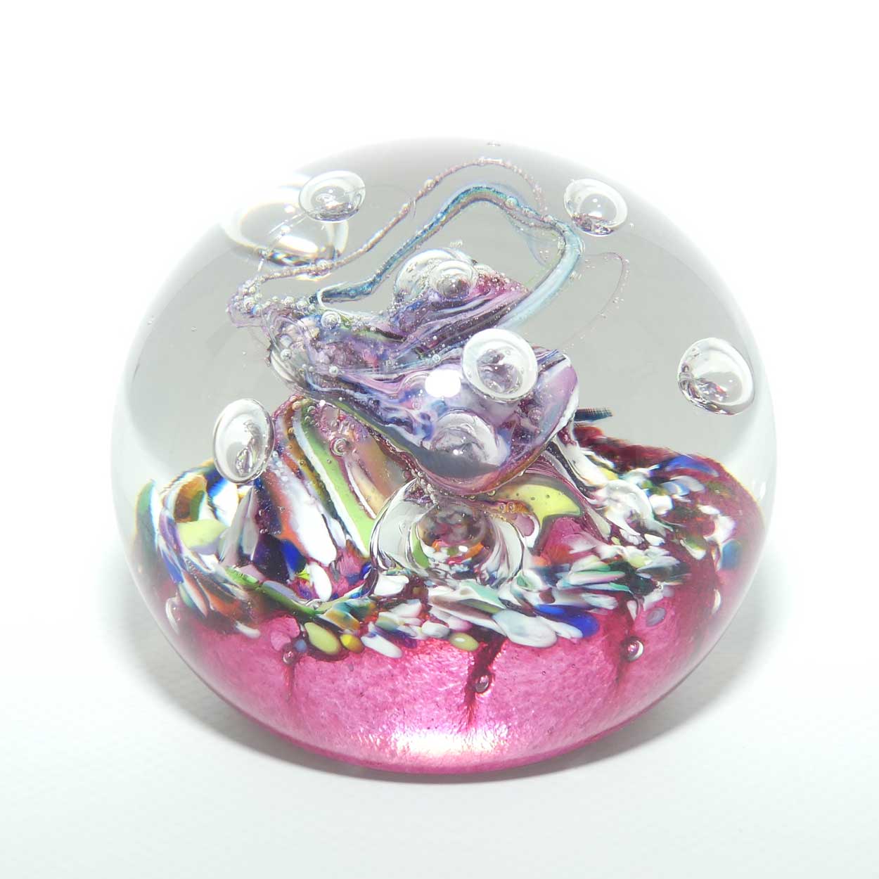 Caithness Glass Myriad design Controlled Bubble Magnum paperweight | Cranberry
