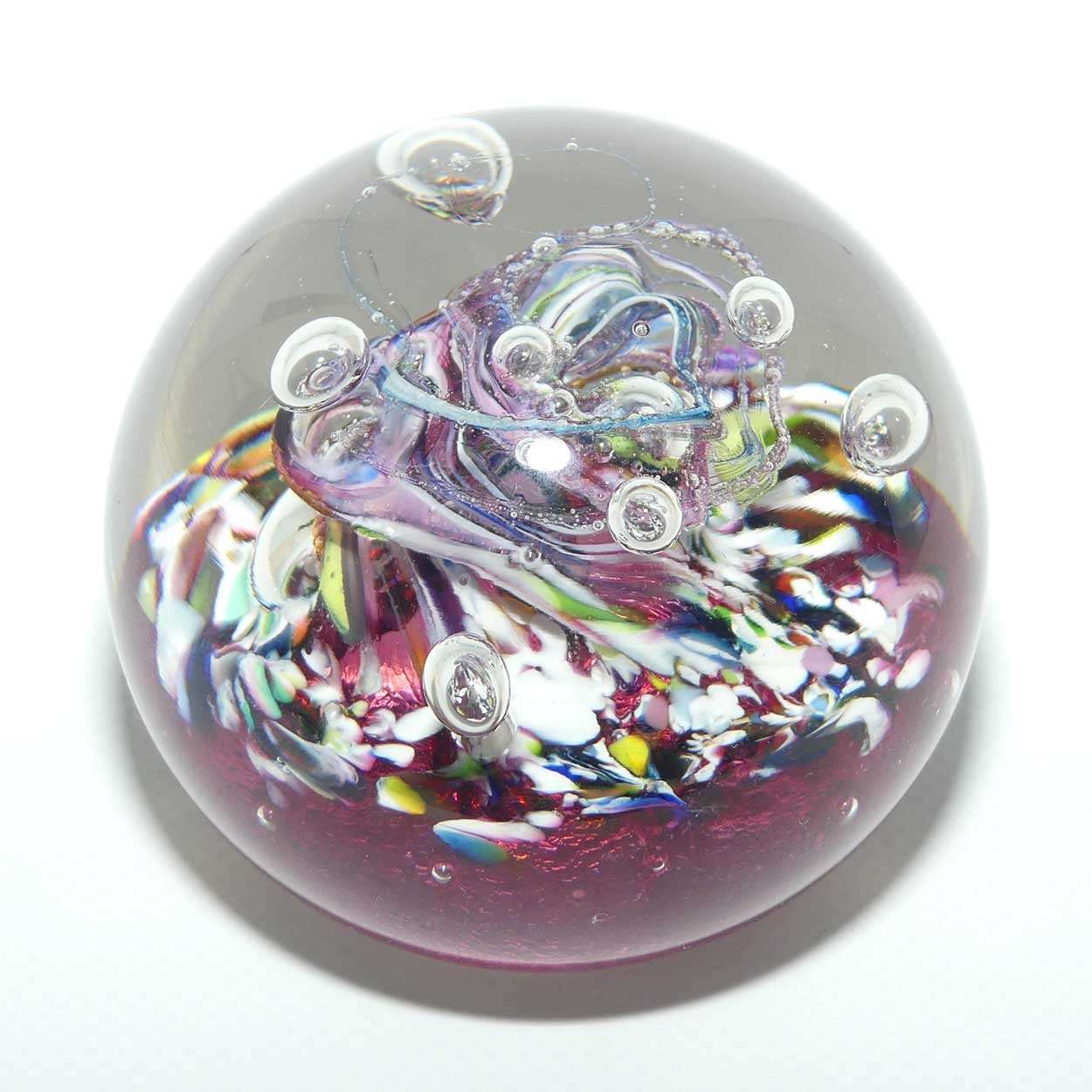 Caithness Glass Myriad design Controlled Bubble Magnum paperweight | Cranberry