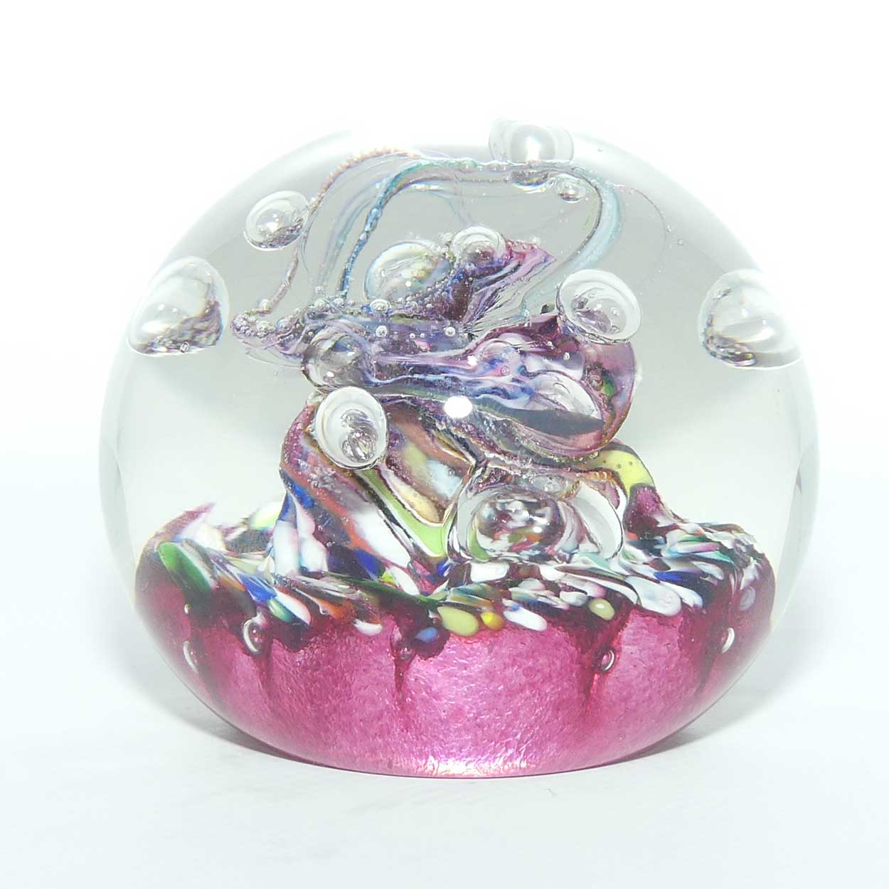 Caithness Glass Myriad design Controlled Bubble Magnum paperweight | Cranberry