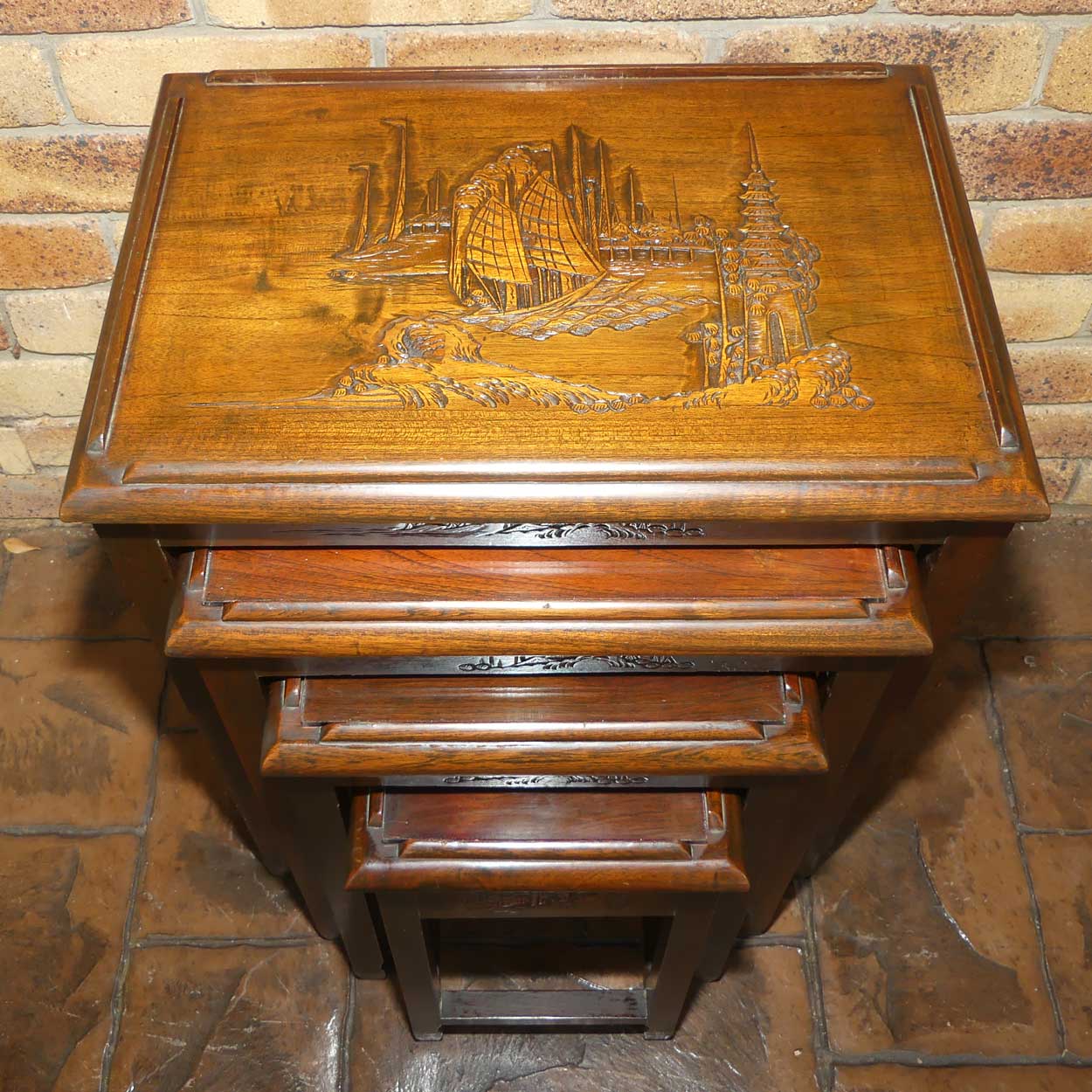 Chinese Carved Nest of 4 Occasional tables with Glass tops