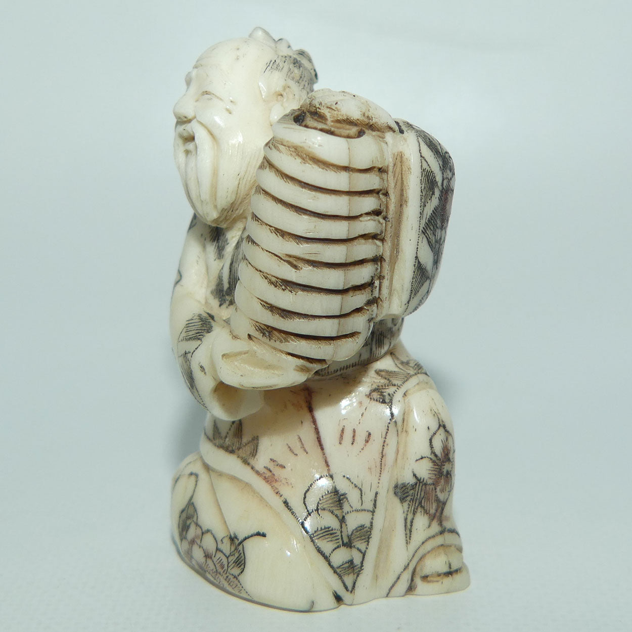 Japanese Carved Bone Netsuke | Old Man holding Lantern
