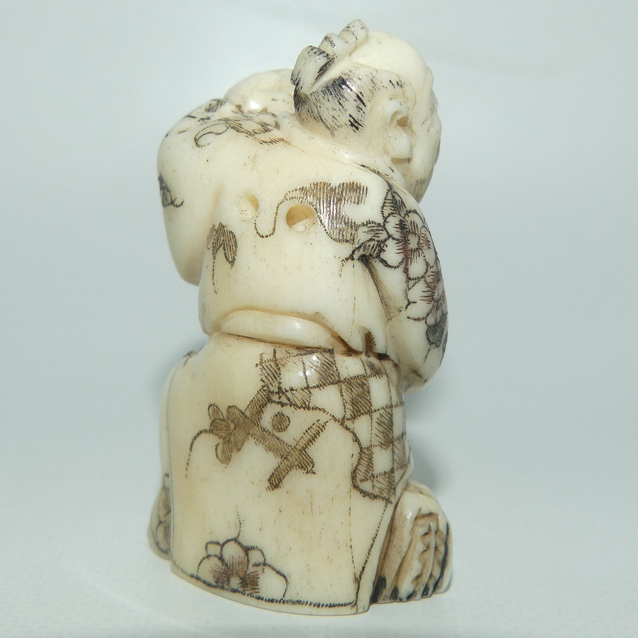 Japanese Carved Bone Netsuke | Old Man holding Lantern