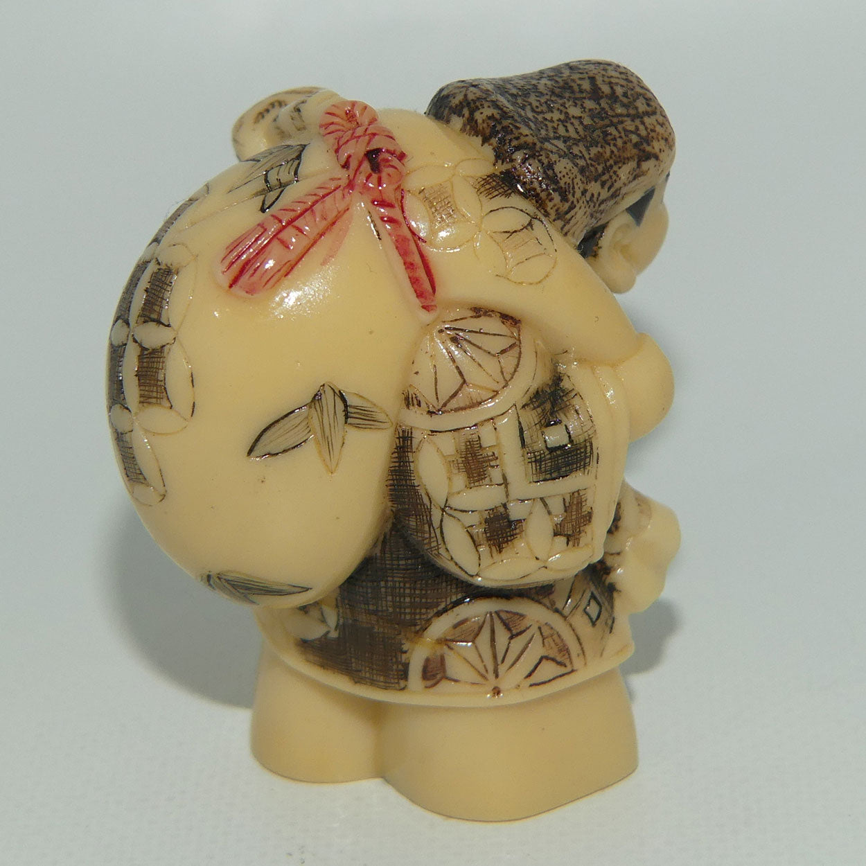 Vintage Japanese Carved Resin Netsuke | Man Carrying Sack