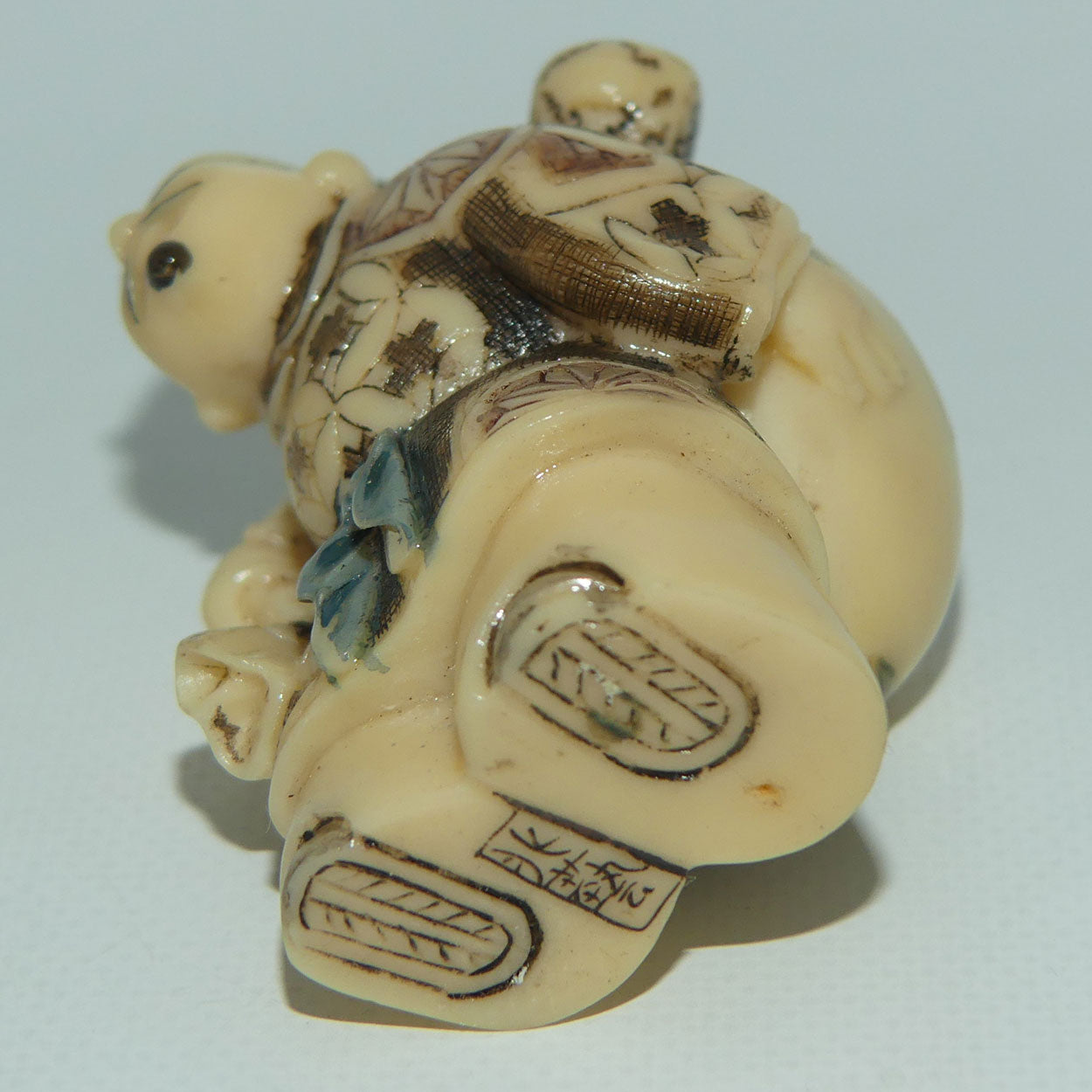 Vintage Japanese Carved Resin Netsuke | Man Carrying Sack