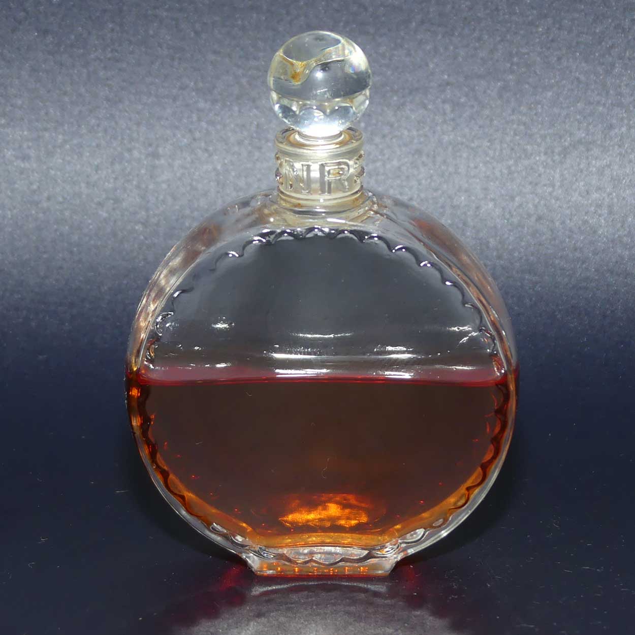 Nina Ricci L'air du Temps 1948 round perfume bottle with stopper and partial contents by Lalique France