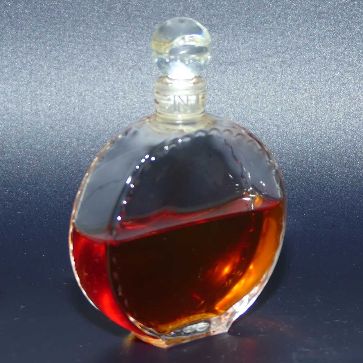 Nina Ricci L'air du Temps 1948 round perfume bottle with stopper and partial contents by Lalique France