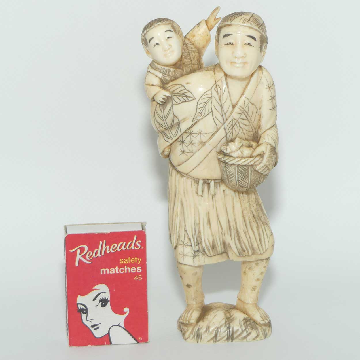 Japanese Carved Ivory Okimono figure | Father and Son Fisherman