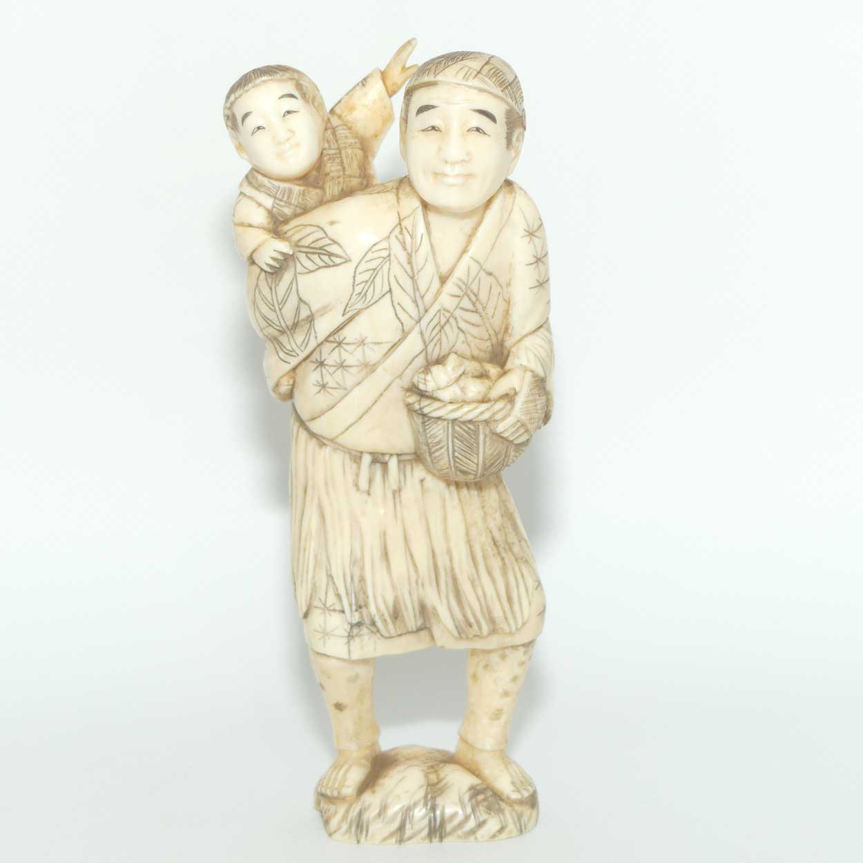 Japanese Carved Ivory Okimono figure | Father and Son Fisherman