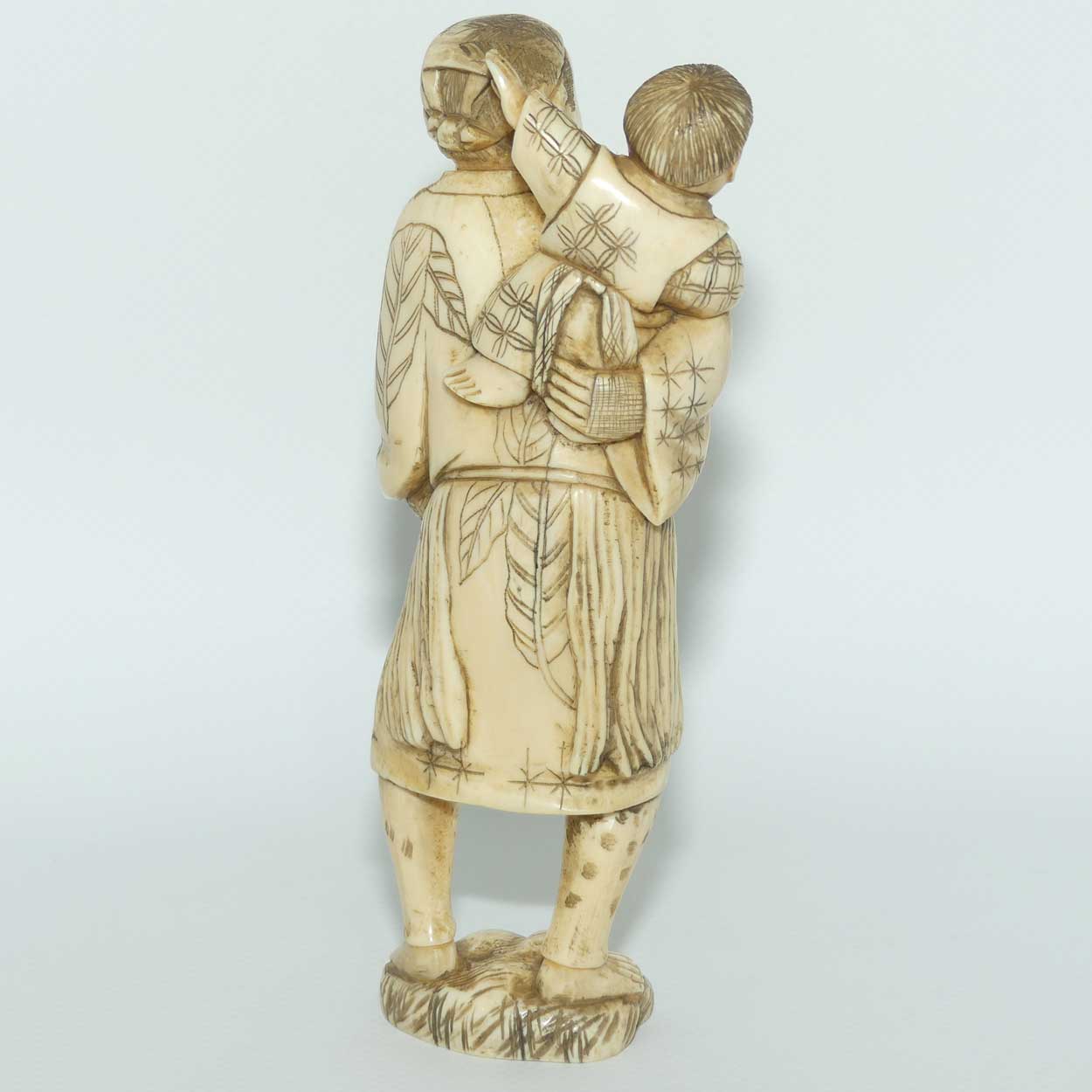 Japanese Carved Ivory Okimono figure | Father and Son Fisherman