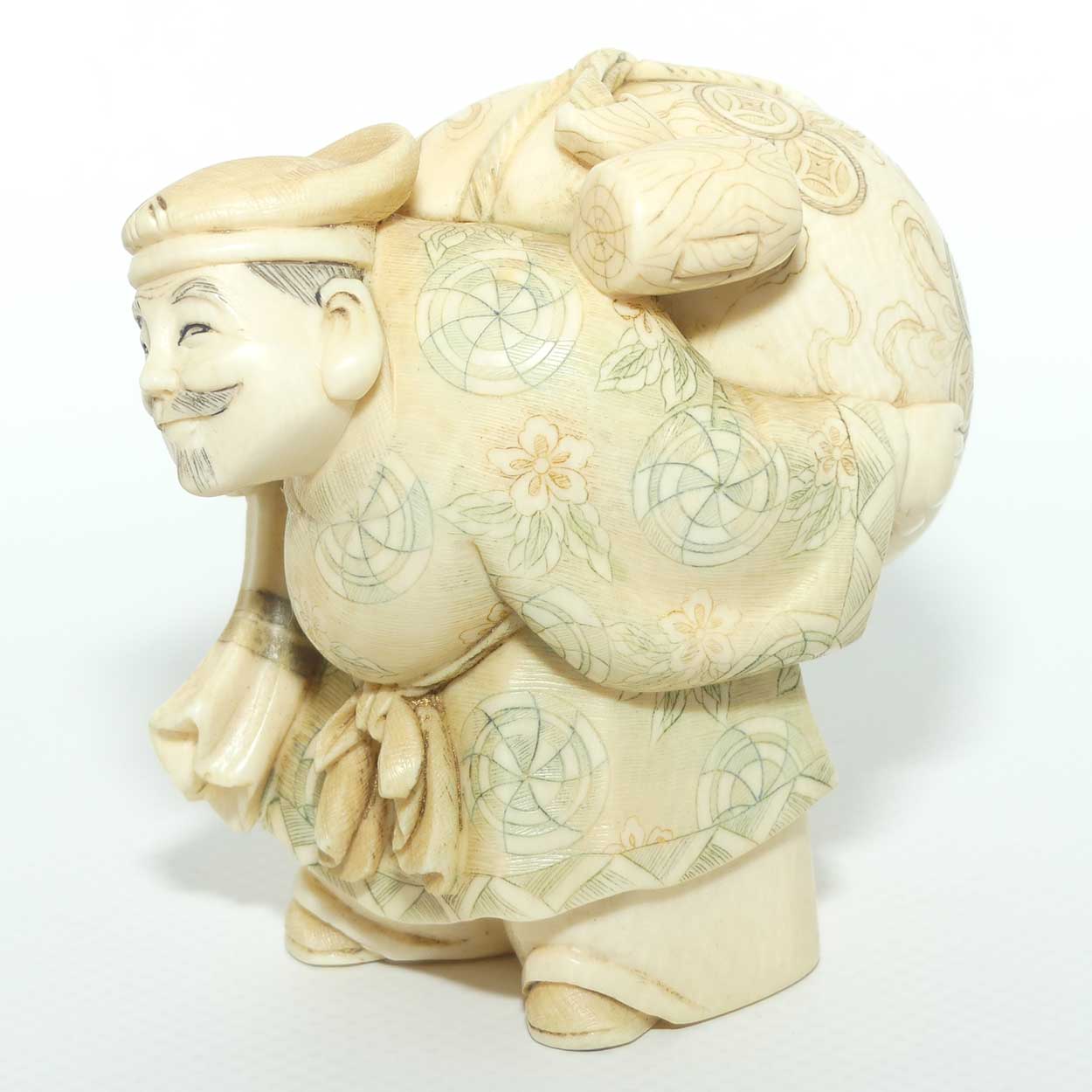 Japanese Carved Ivory Okimono figure | Travelling Man Carrying large Sack